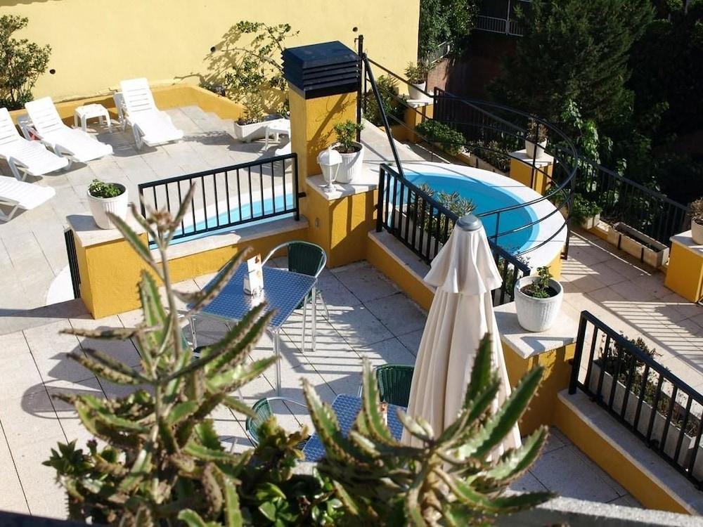 Apartaments Ar Enjoy Monjardi Льорет-де-Мар Экстерьер фото