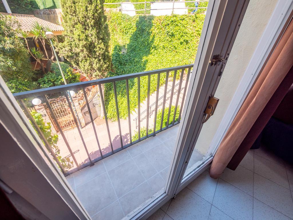 Apartaments Ar Enjoy Monjardi Льорет-де-Мар Экстерьер фото